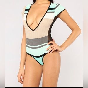 Womens Med Stripped Bodysuit - New NEVER WORN. Still in package. Good condition
